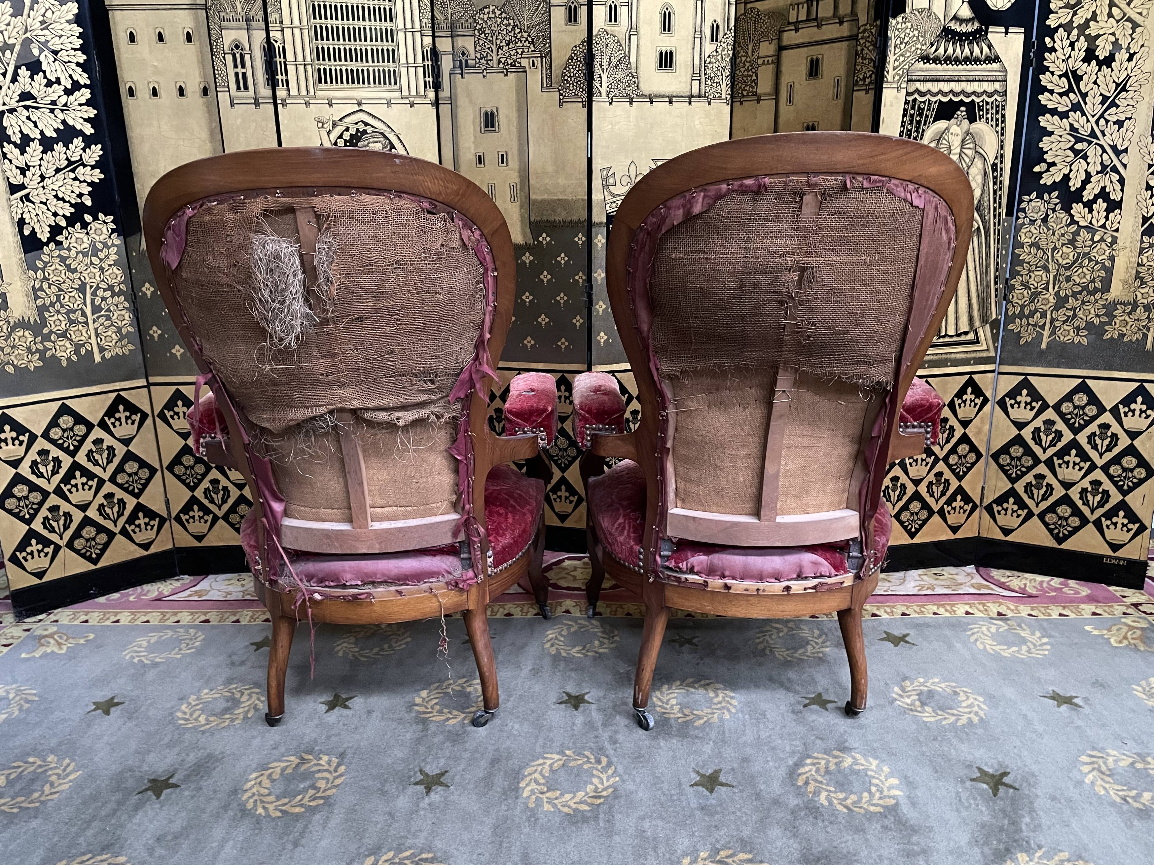 Pair of Louis Philippe period armchairs with rack and pinion