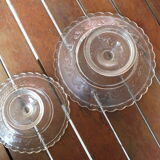 Duo of molded glass display cups, arabesque décor