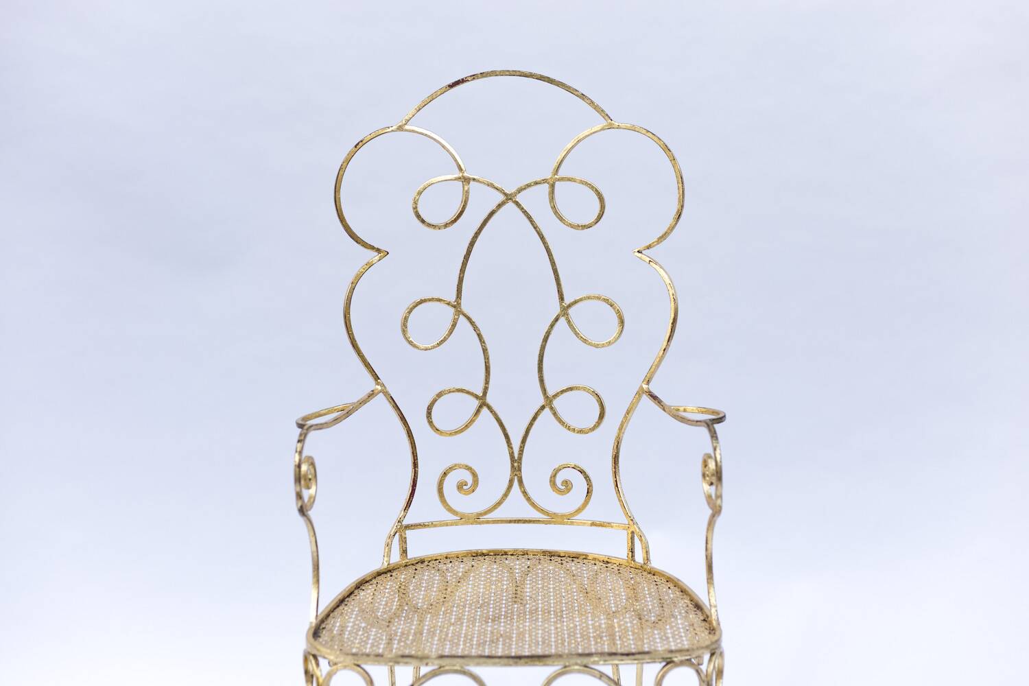 Pair of wrought iron and gilded armchairs, circa 1990