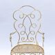 Pair of wrought iron and gilded armchairs, circa 1990