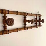 Vintage wooden wall coat rack with 4 swivel hooks from 1920