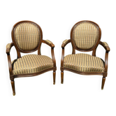 Pair of Louis XVI cabriolet armchairs – medallion backrest