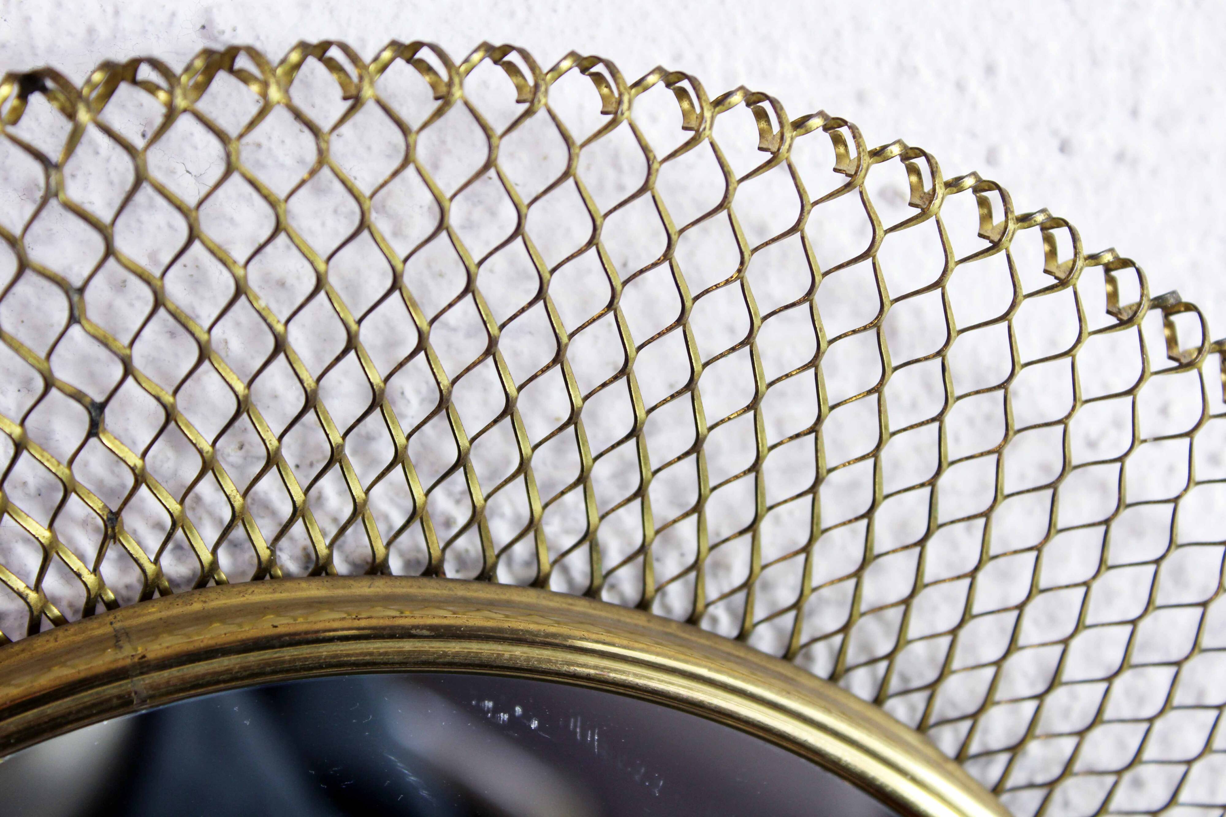 Round gold metal mirror