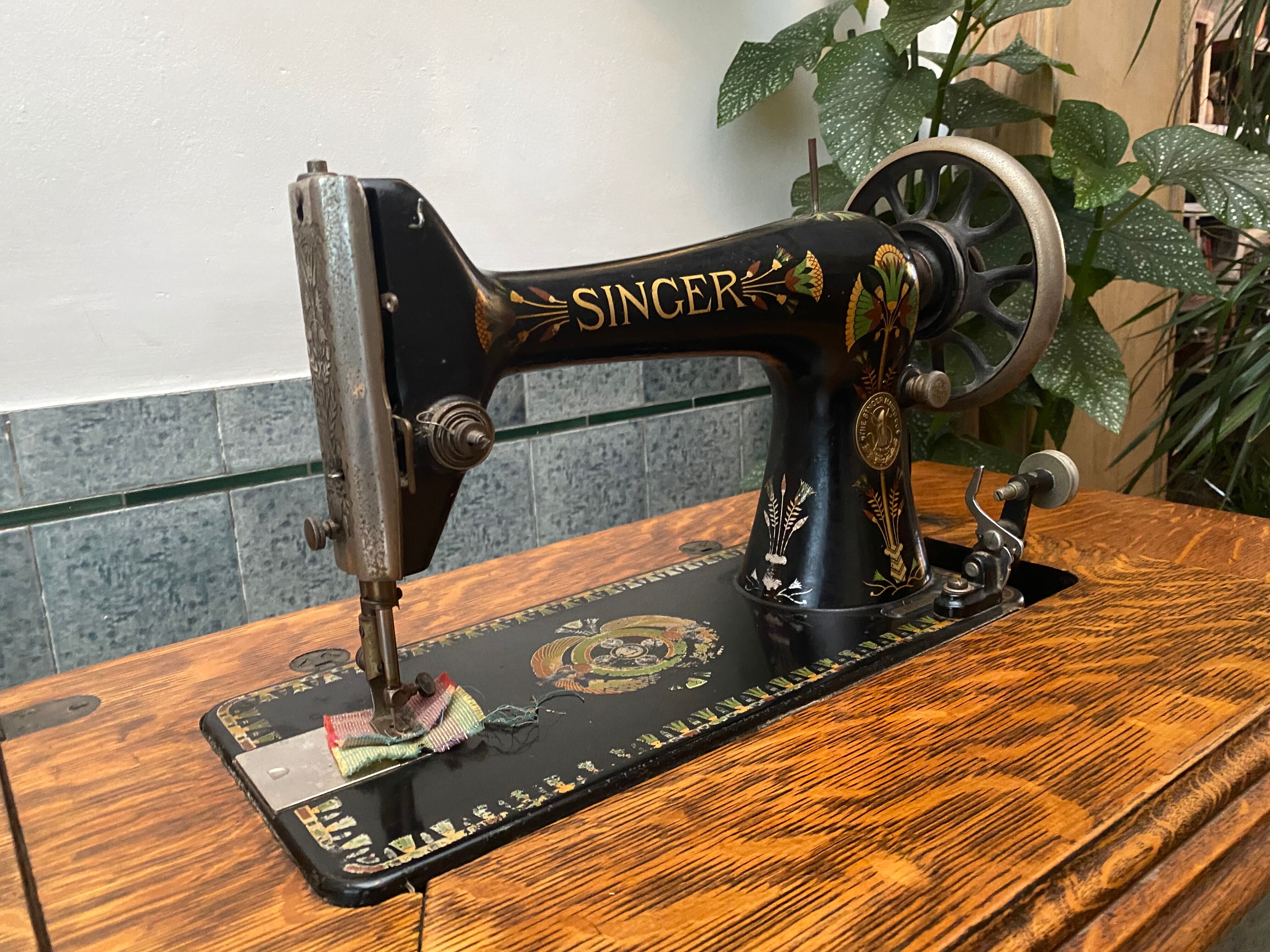 Superb old Singer sewing machine with its table