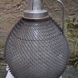 Demijohn, glass demijohn, with protective metal mesh, 1950-1960