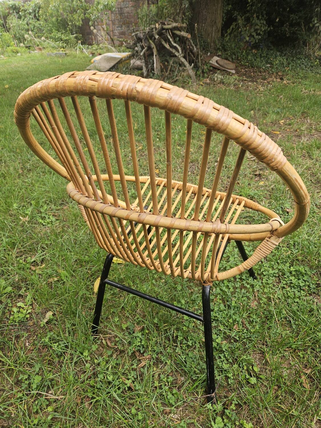 Vintage rattan armchair and coffee table attributed to Rohe Noordwolde