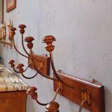 Pair of double coat hooks from the end of the 19th century, circa 1900, in wood and varnished metal