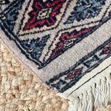 Antique Persian rug, signed.