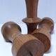 Three vintage patinated solid wood candlesticks