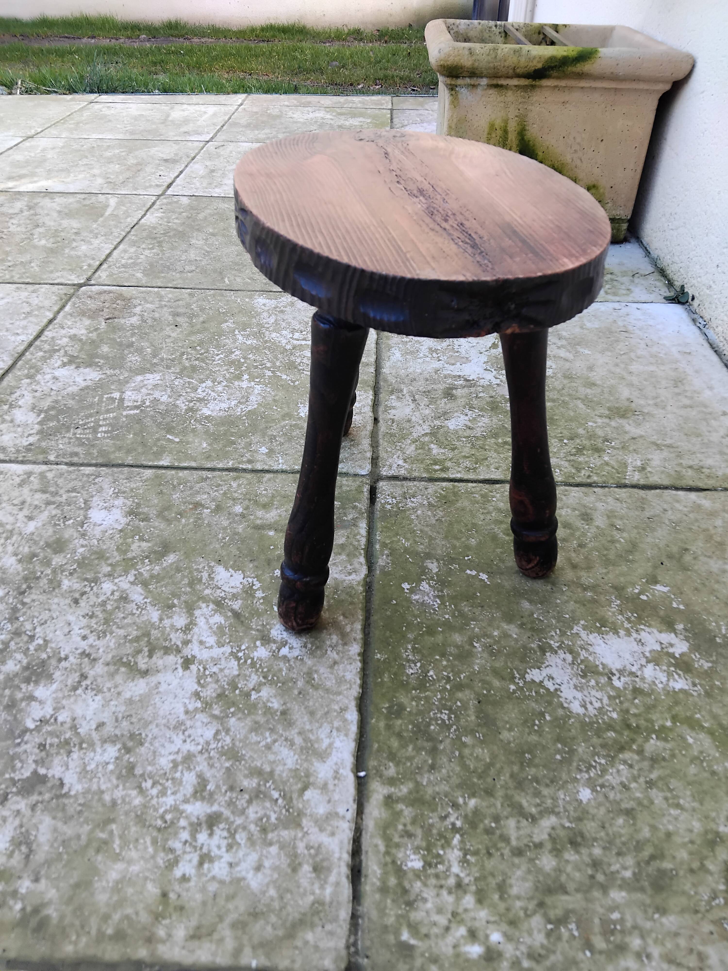 Old vintage oval tripod stool