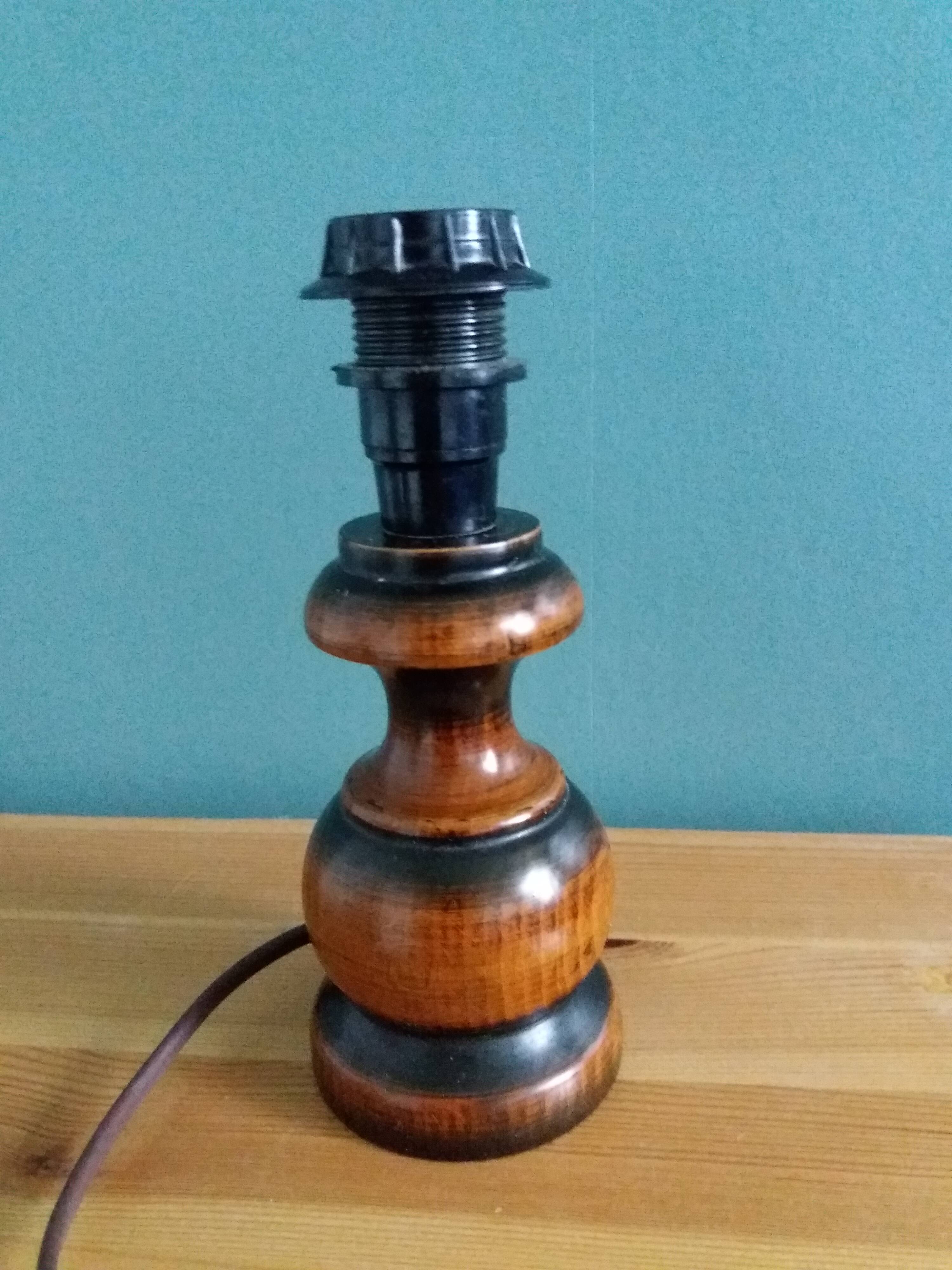 Turned wood bedside lamp with fabric lampshade