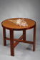 Table ronde en merisier et acajou des années 1930
