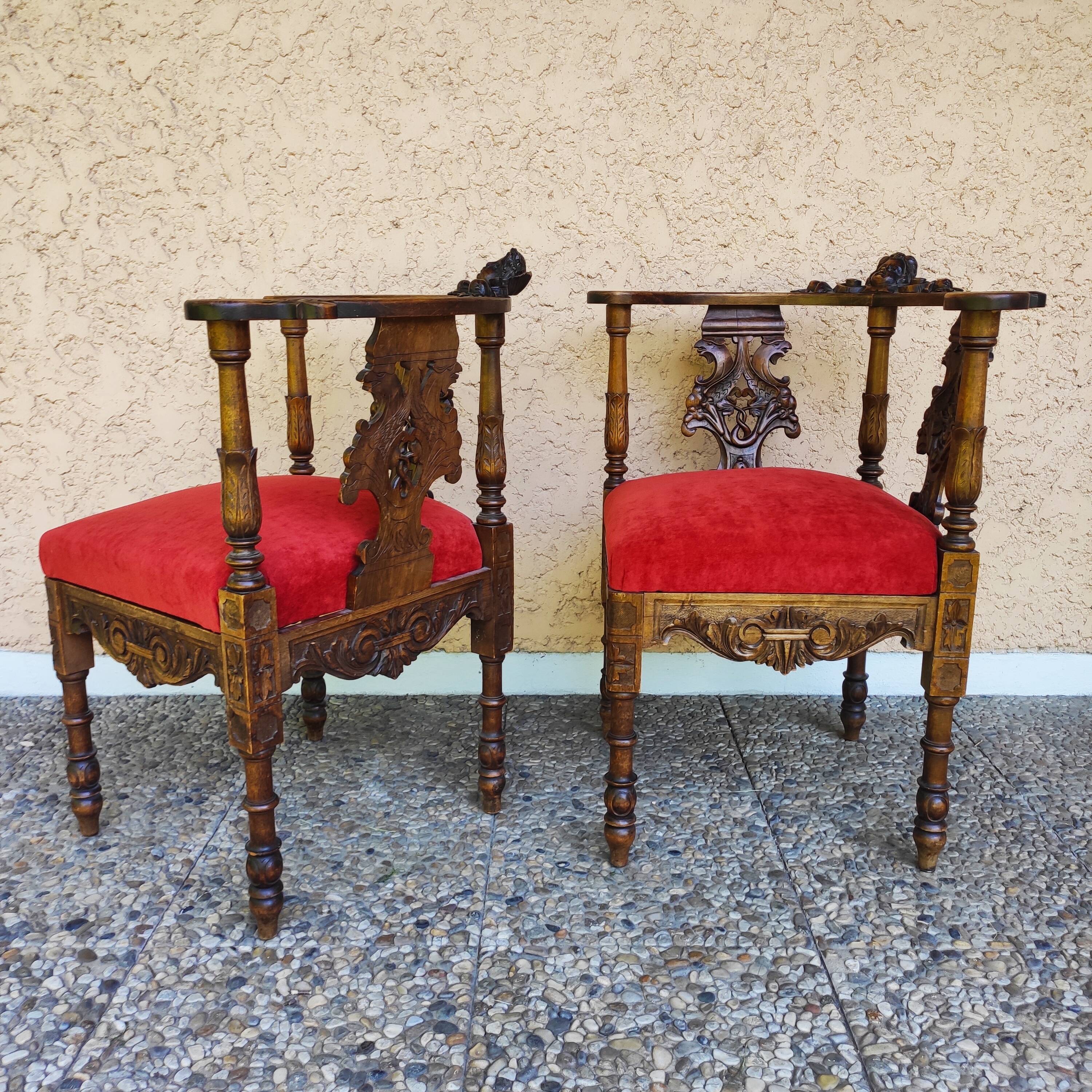 Pair of neo-Renaissance Henri II corner armchairs in carved wood, 19th century.