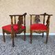 Pair of neo-Renaissance Henri II corner armchairs in carved wood, 19th century.