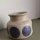 Mid-century modern stoneware vase with cobalt blue dots.