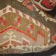 Vintage three-seater canapé by George Smith upholstered in Kilim with feather cushions.