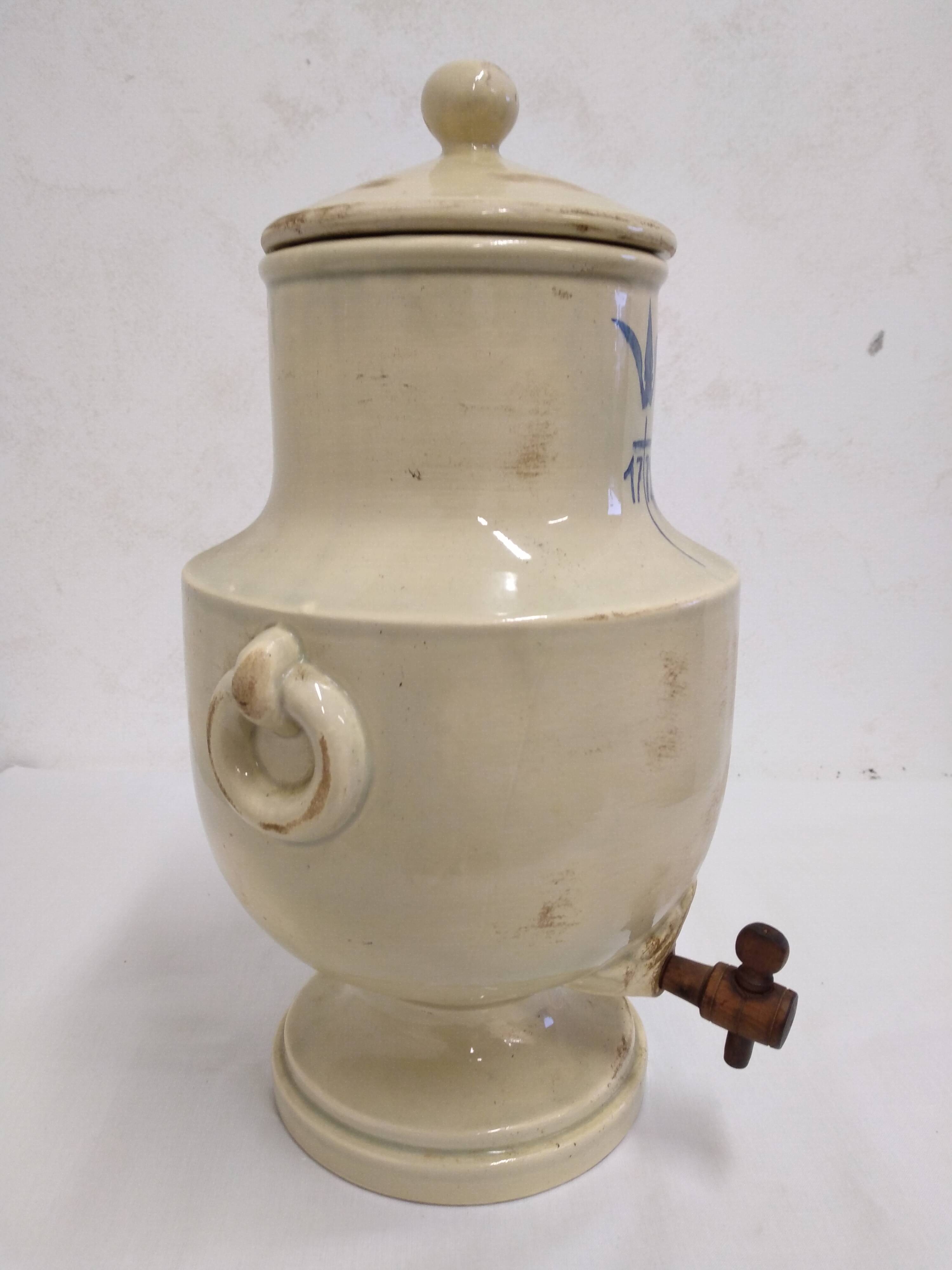 Old stoneware vinegar maker