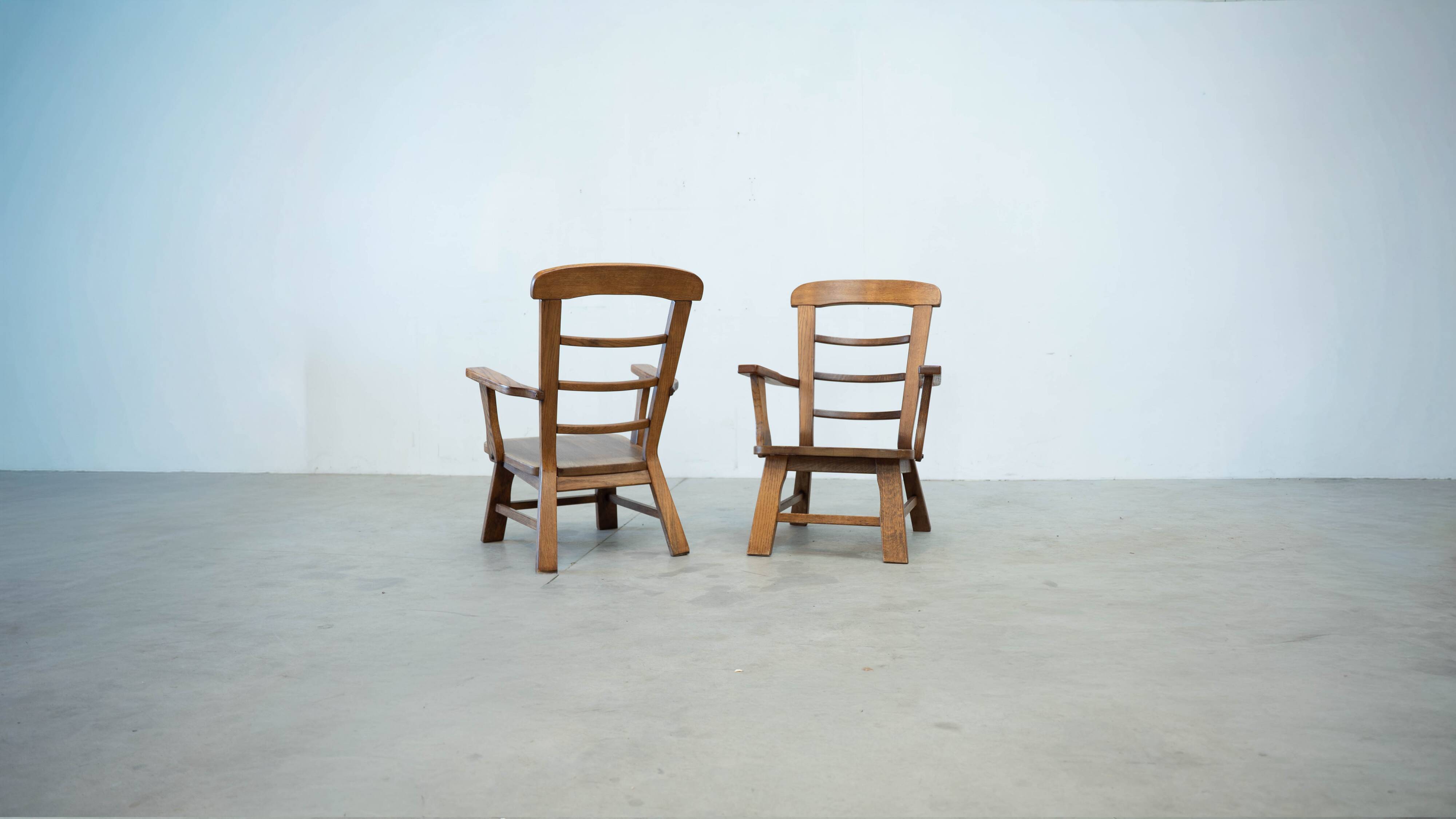 Set of two oak lounge chairs