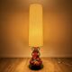 Orange ceramic sun lamp with jute fabric from the 1970s.