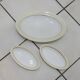 White and yellow porcelain dinner service with gold edging, Poral Limoges France