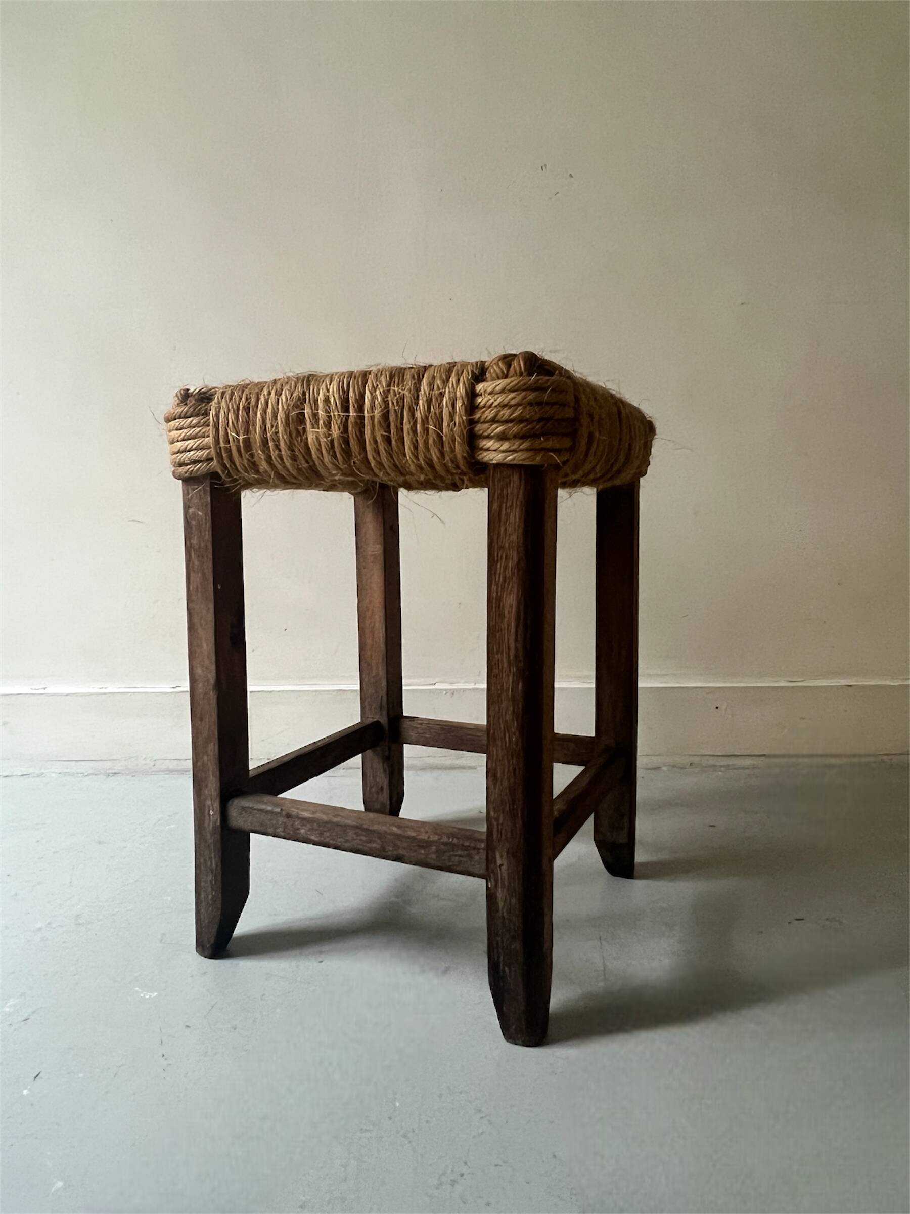 Solid oak stool with woven hemp seat by Audoux Minnet.