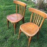 Lot of two wooden bistro chairs