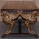 Double-sided writing desk in hardwood with gilt griffins, RJ Horner style.