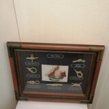 Frame marine knots in wood and brass