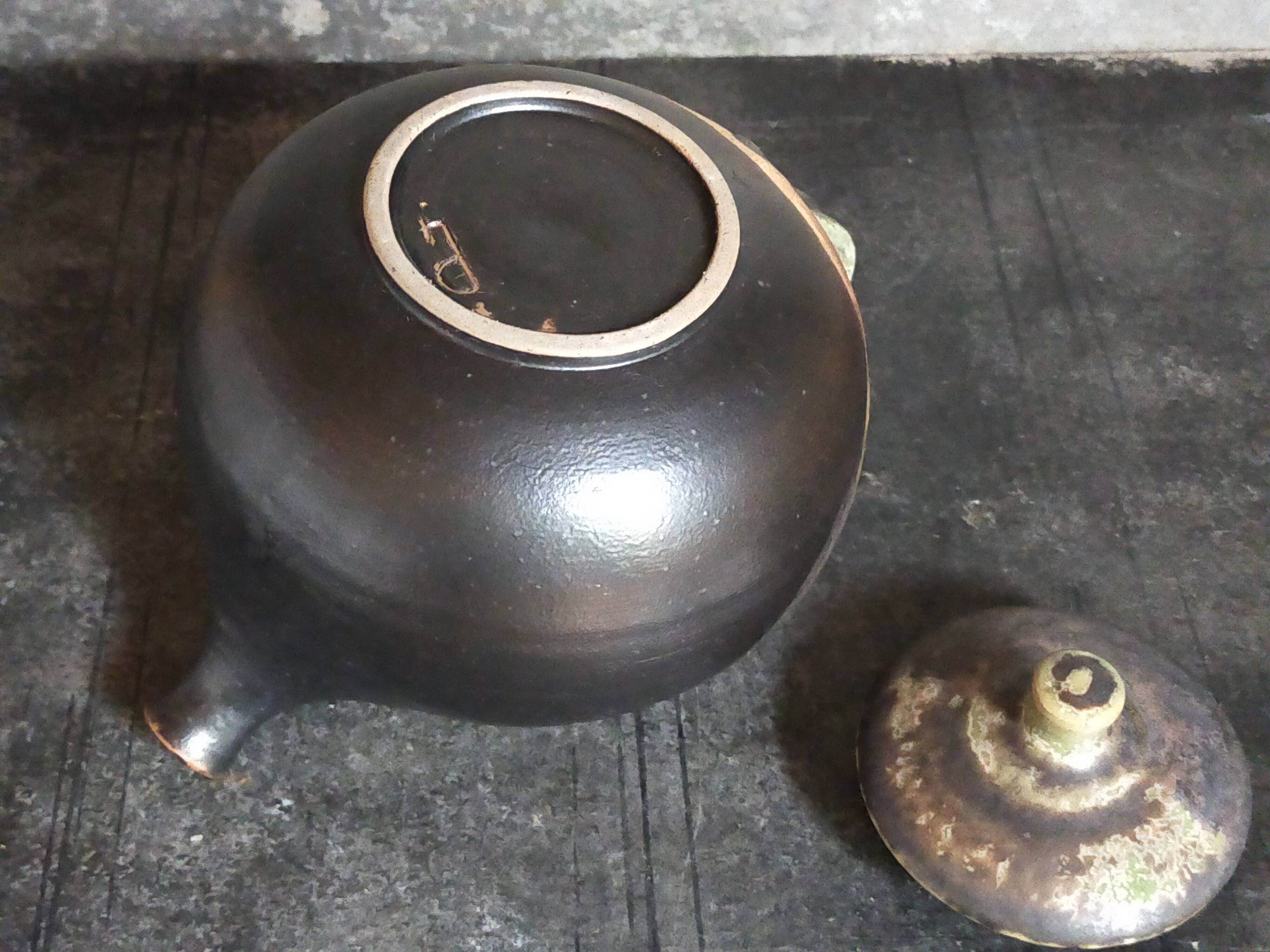 Vintage enameled stoneware potter's teapot