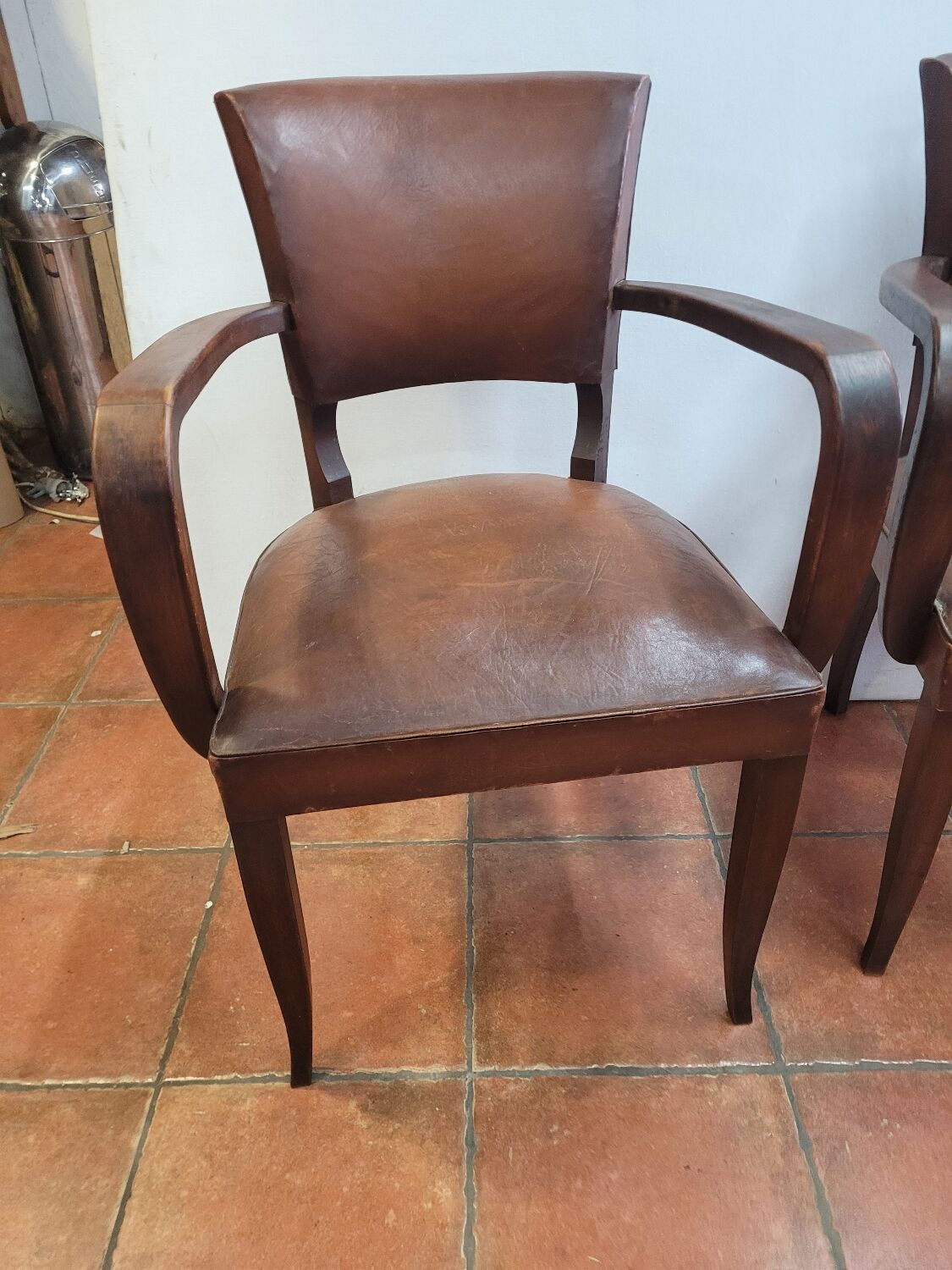 Pair of antique leather bridge armchairs