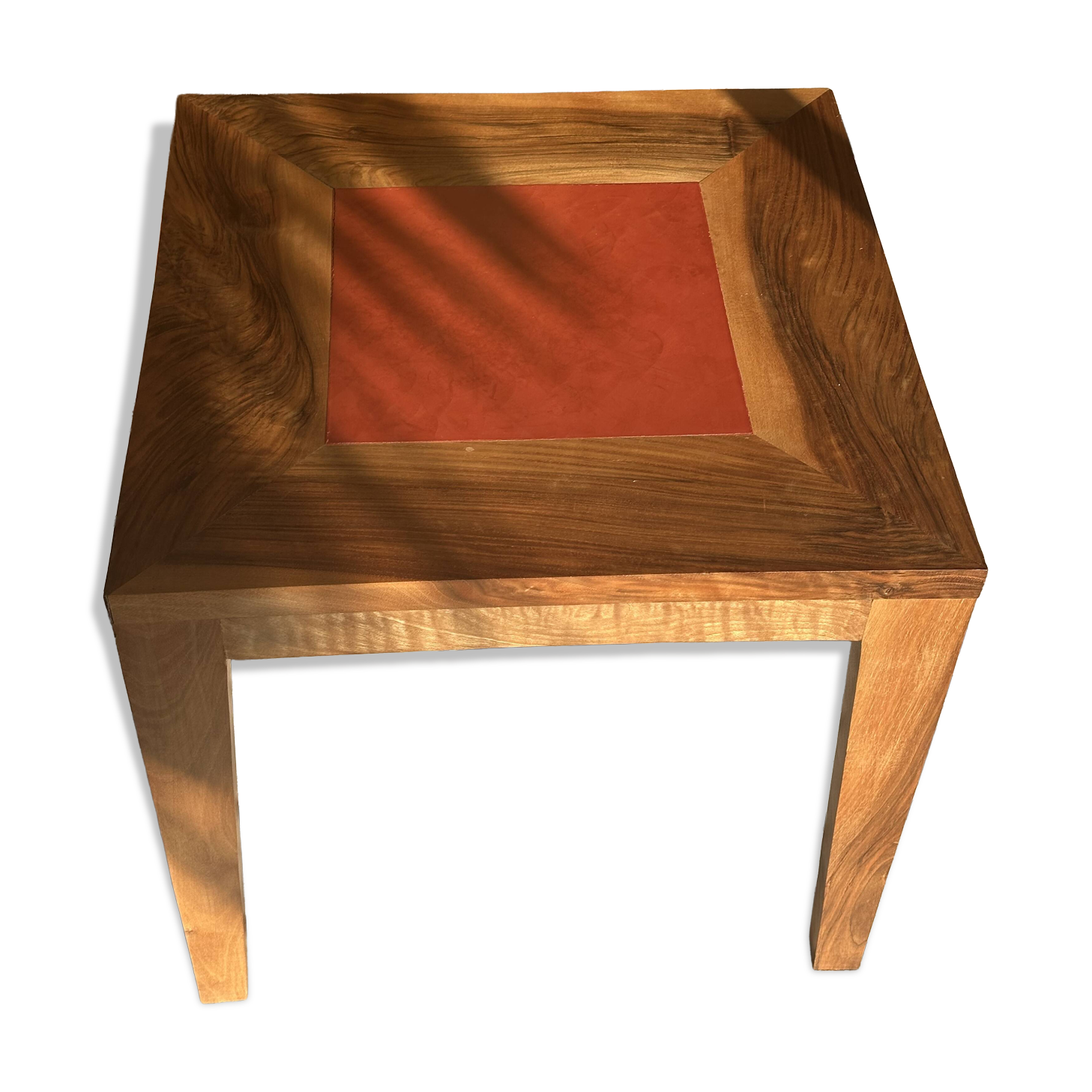 Coffee table in walnut with a tadelakt top.