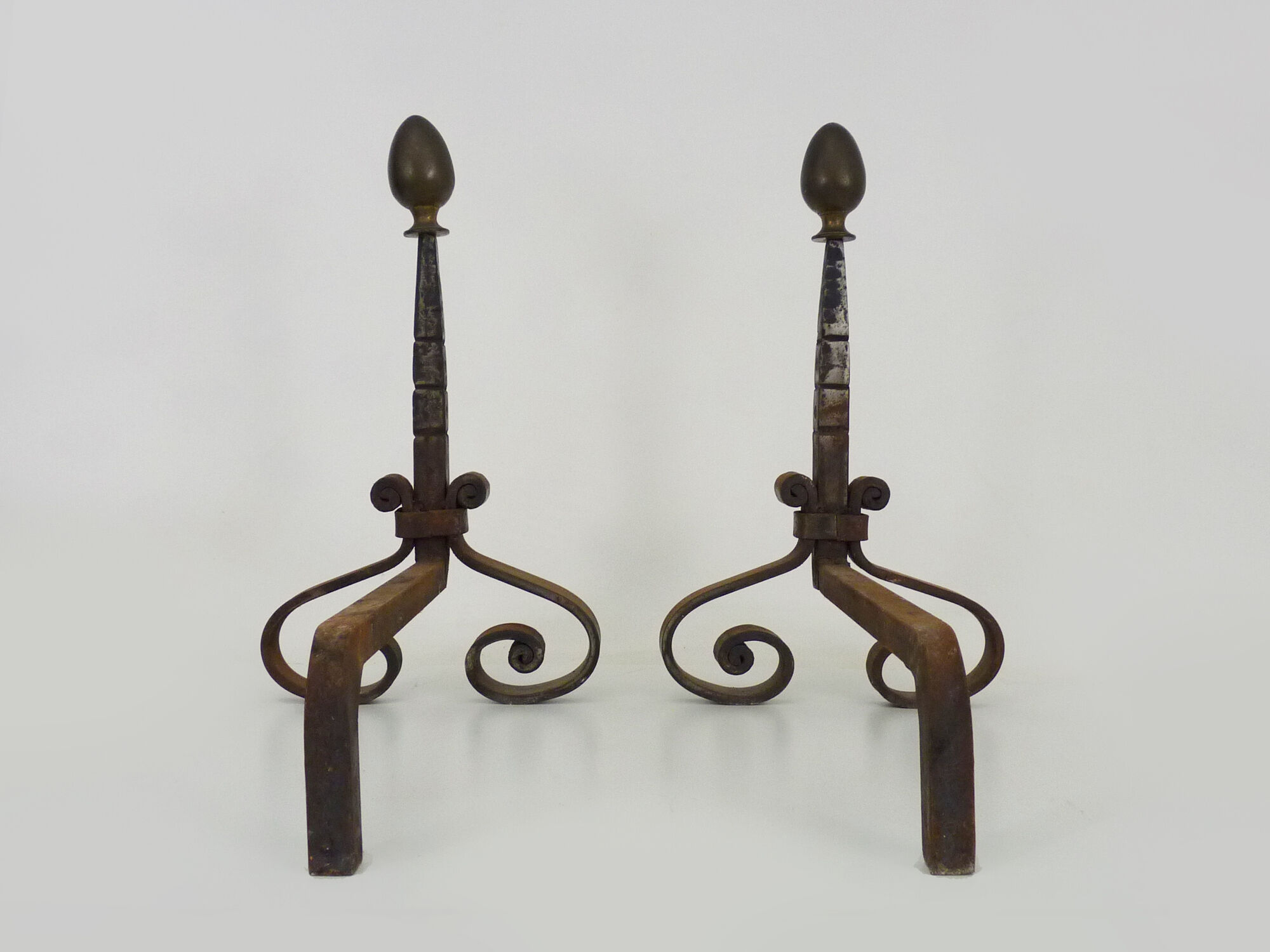 Pair of cast iron, wrought iron and brass chimney chenets. france 19th century