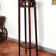 Antique high wooden pedestal with mahogany patina, circa 1900-1925.