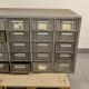 Antique metal workshop furniture has 20 drawers