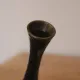 Vintage brass soliflore vase with black, red, and green floral decoration – H 18 cm