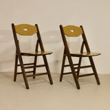 Pair of vintage folding chairs year 50 sculpted backrest.