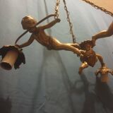 Antique chandelier decorated with cherubs and putti angels taken from the attic