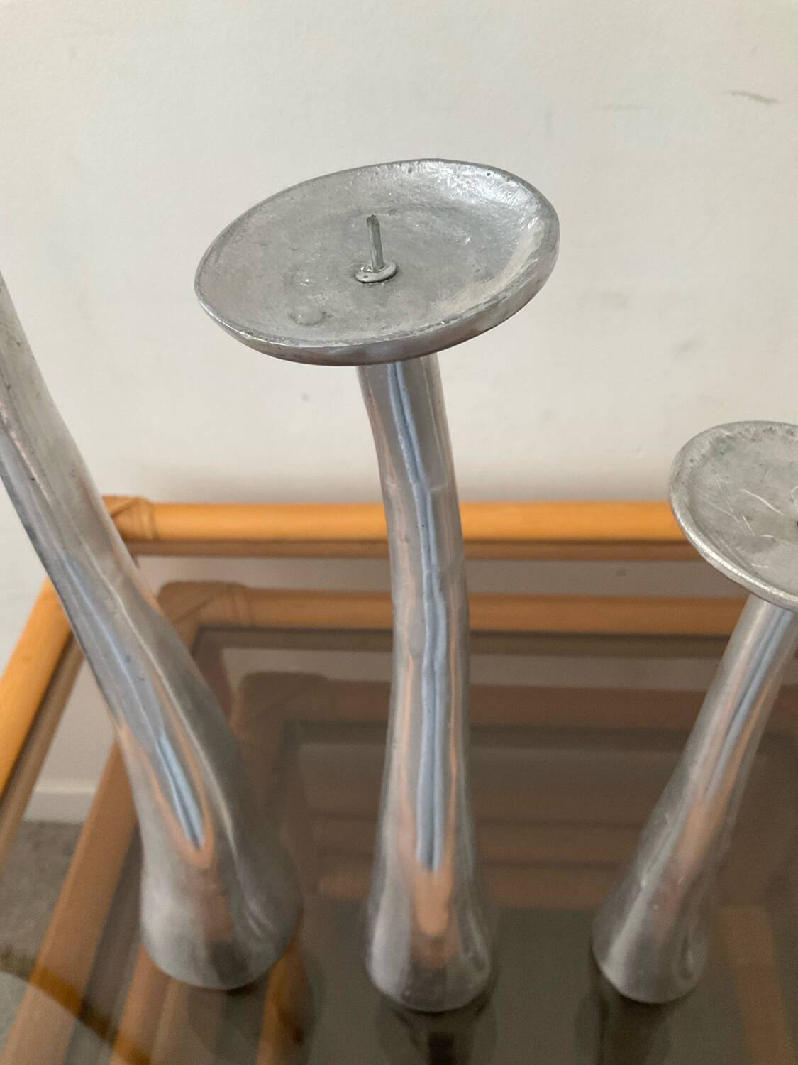 Trio of vintage cast aluminum candlesticks