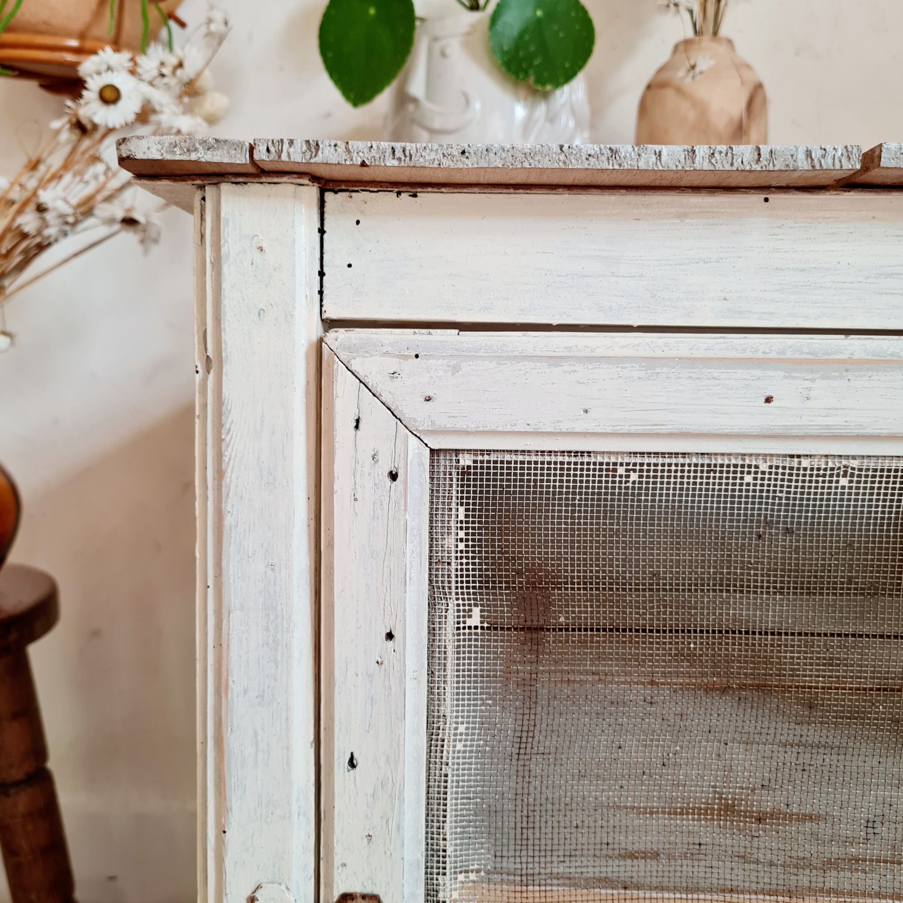 Wooden pantry and white mesh