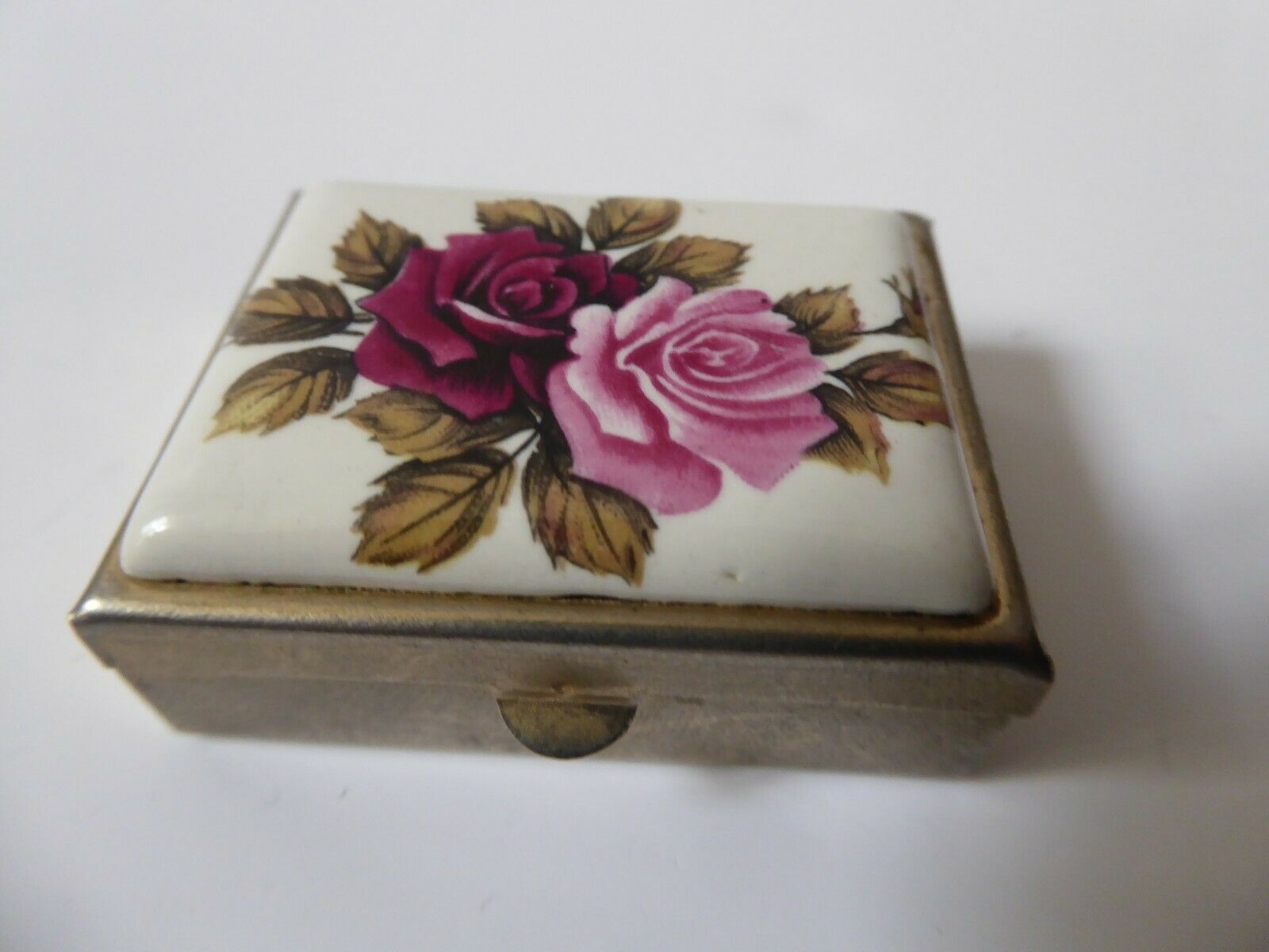 Metal and porcelain pill box roses decorations