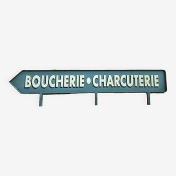 Huge directional sign “Butchery – Charcuterie”