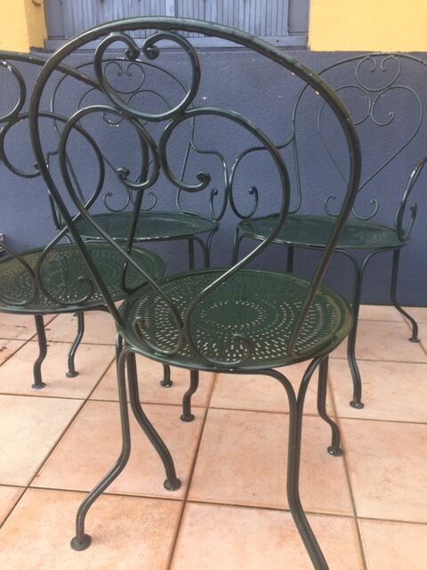 Sets of 2 chairs and 2 garden armchairs in wrought iron DU XXéme