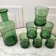 Set of a decanter and 6 glasses colored green bottle 70s
