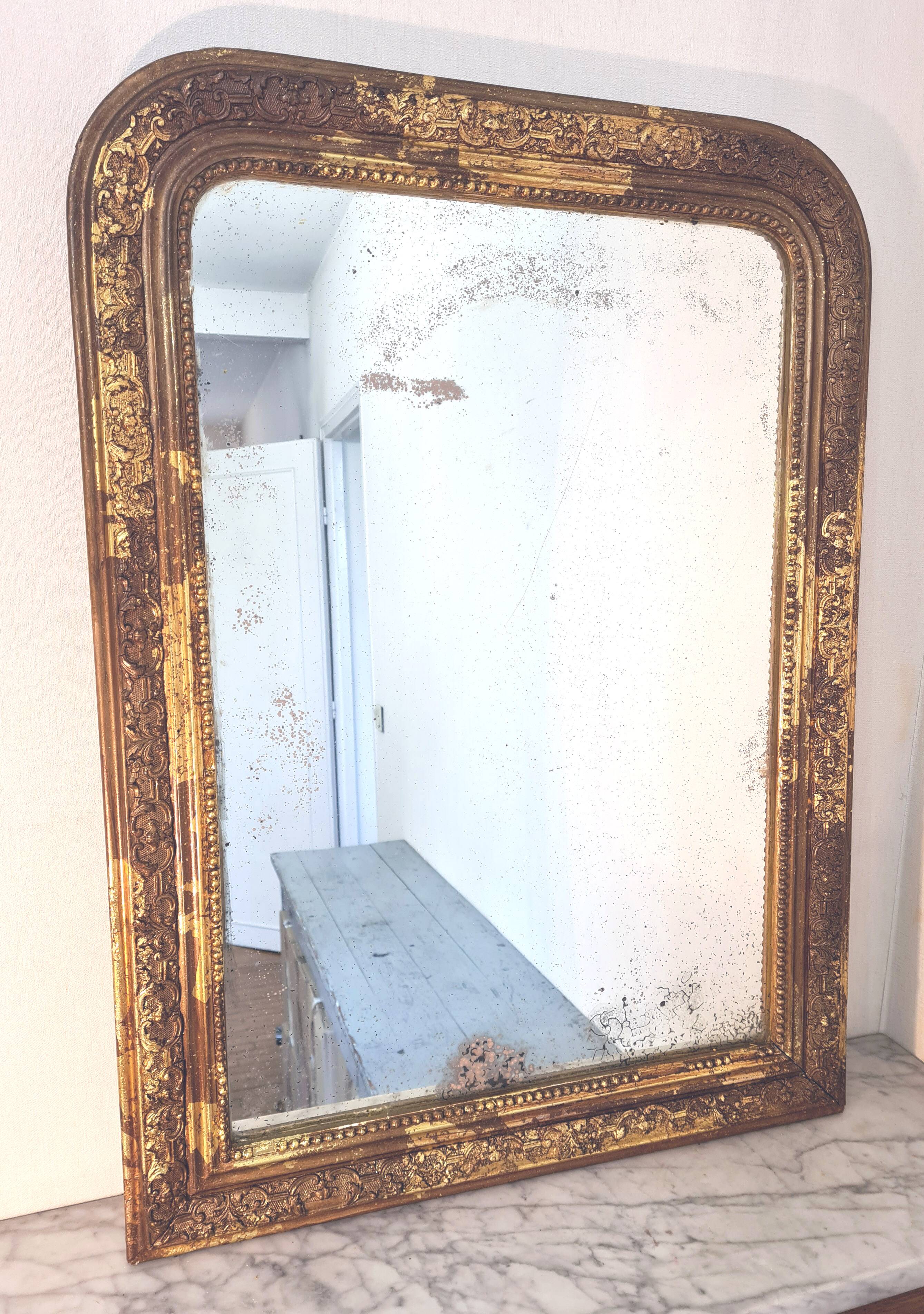 Old Louis Phillipe mercury mirror, in gilded stucco.
