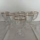 6 crystal stem glasses with a gold rim