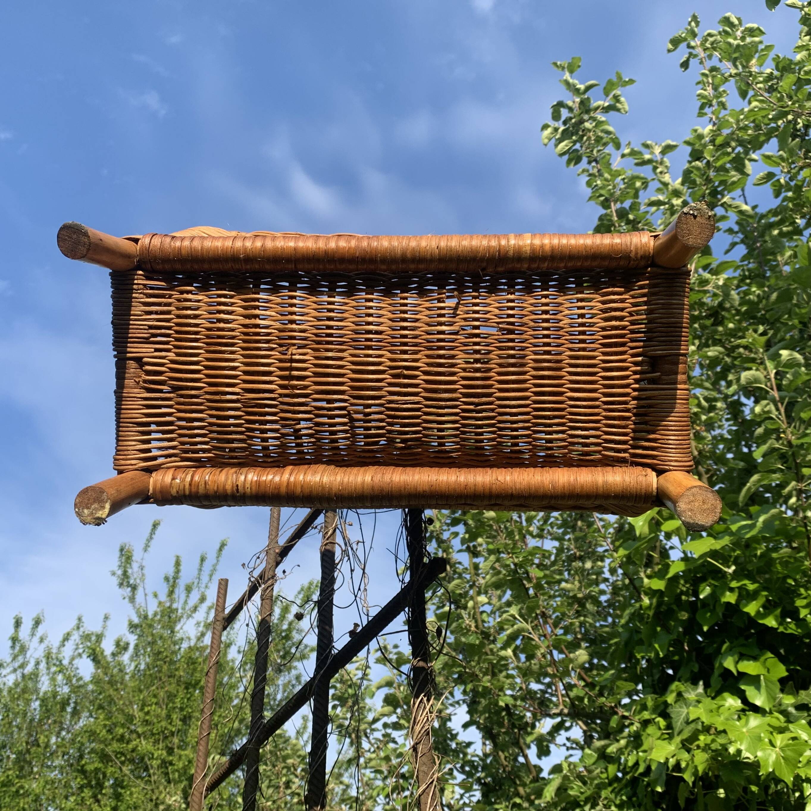 Vintage wicker and bamboo magazine rack