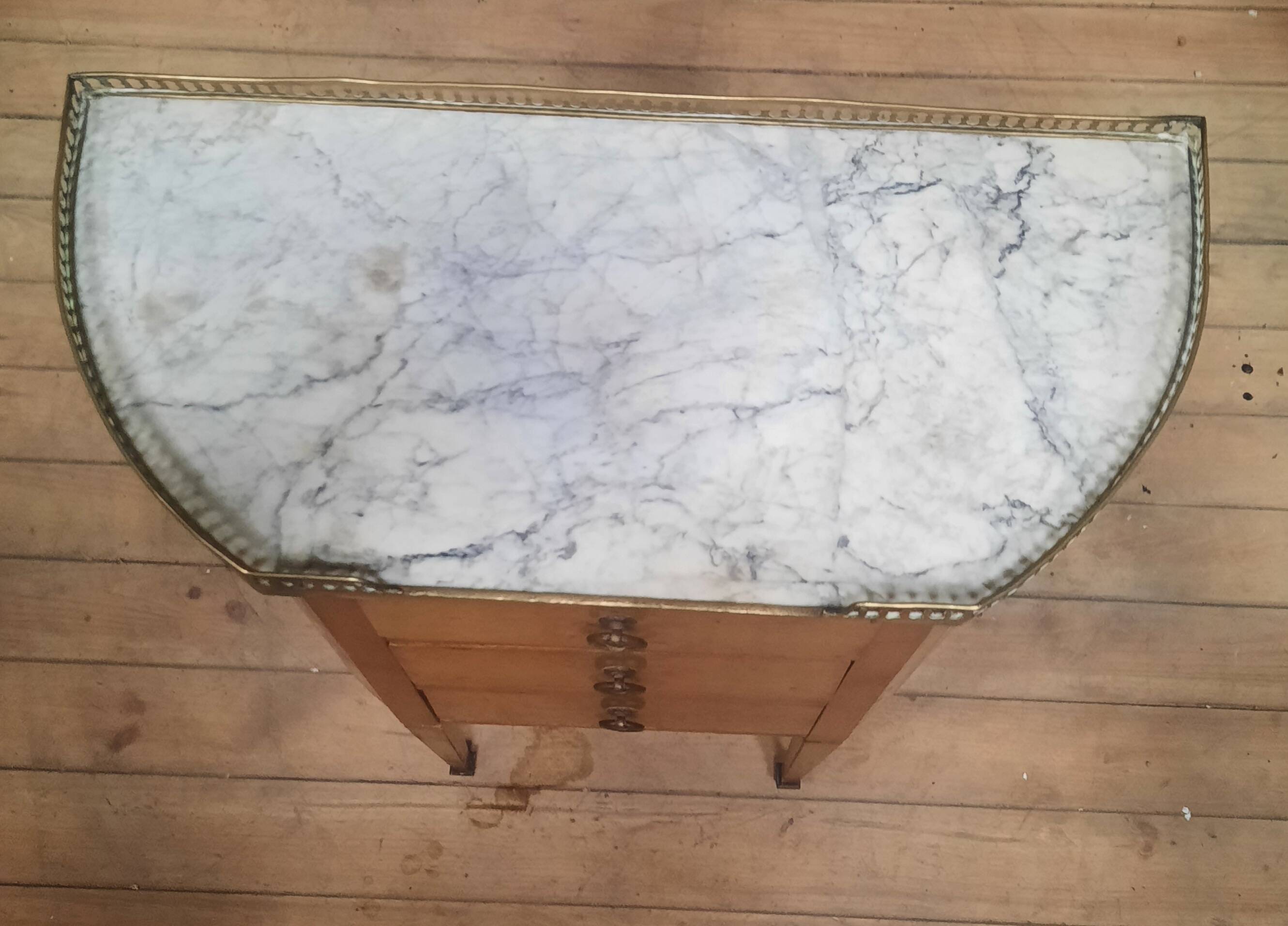 Small Louis XVI style chest of drawers with rounded sides