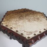 Vintage Spanish stool in carved wood with a leather seat.