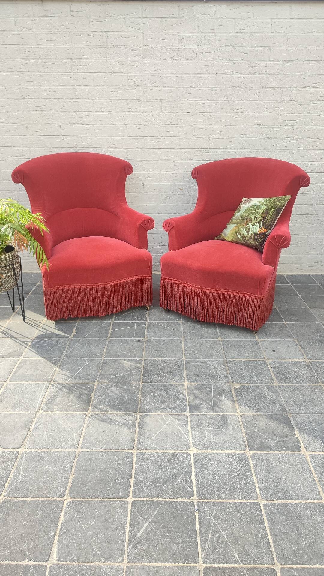 Pair of fringed crapaud armchairs