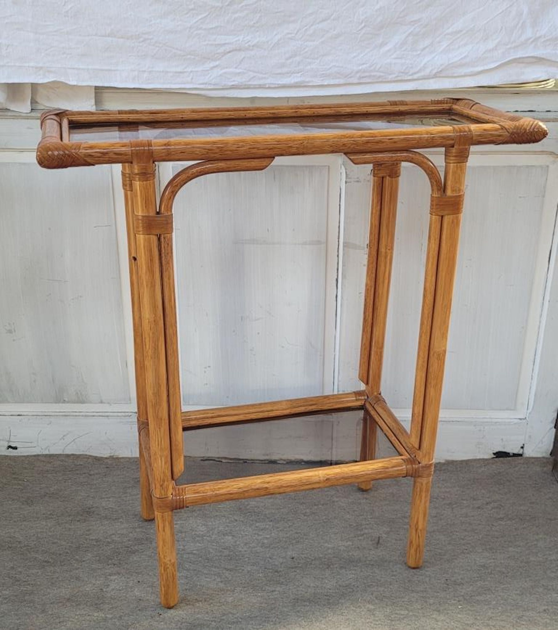 Rattan console and smoked glass Roche Bobois, from the 70s